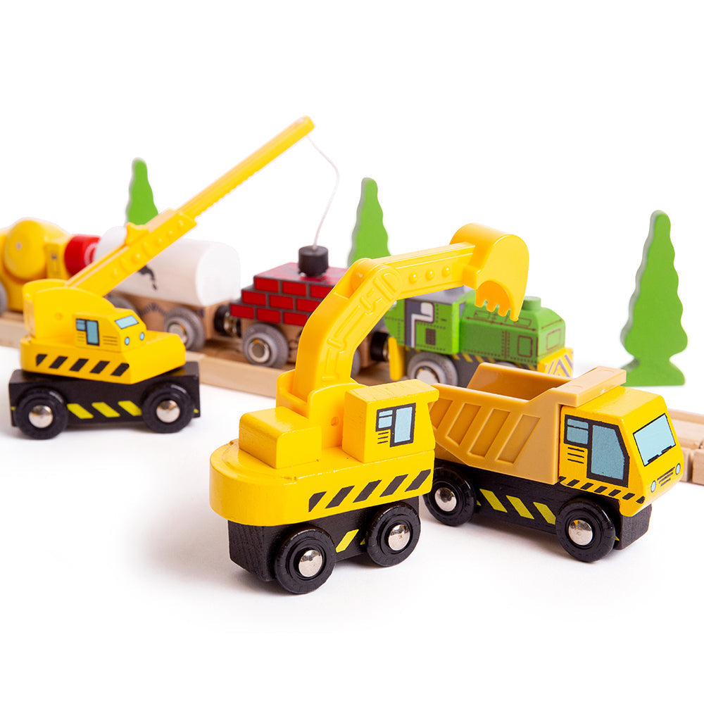 Construction Site Vehicles, Need extra assistance on your Construction Wooden Train Set? These bright yellow Site Vehicles can dig holes, roll tarmac and carry away the rubble from the building site and are the perfect wooden train accessories. This construction toy set includes a construction lorry with tipper, a roller, scooper, bulldozer and digger. Endless hours of creative role play fun are to be had! The chunky sizes are ideal for little hands to push along smooth surfaces. The construction vehicles a