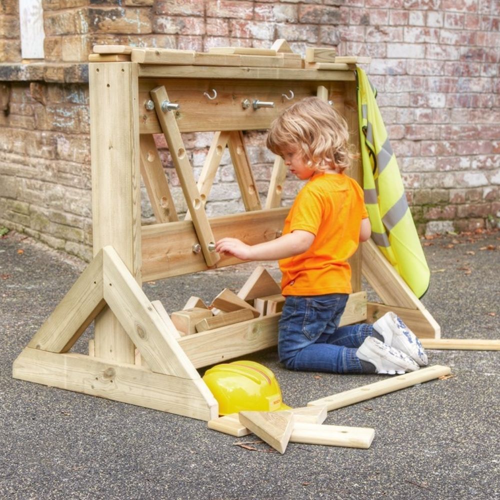 Construction Wall, Position, place, screw, pull and build using this stunning Construction Wall. Children will love mimicking DIY jobs with this Construction Wall. The set includes wooden planks with drill holes, so they can be attached to the frames as well as a variety of wooden construction blocks. Bolts are fixed to the wall, and screwing the nuts that are included will aid development in fine motor skills and hand-eye co-ordination, as well as increasing problem solving skills. Made from FSC Scandinavi