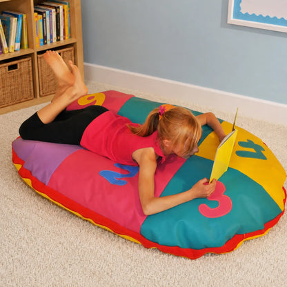 Cosy Oval Number Cushion with child reading in classroom reading corner
