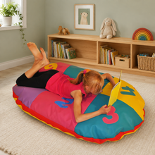 Cosy Oval Number Cushion with child reading in nursery