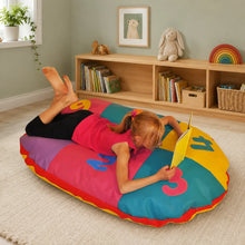 Cosy Oval Number Cushion with child reading in nursery