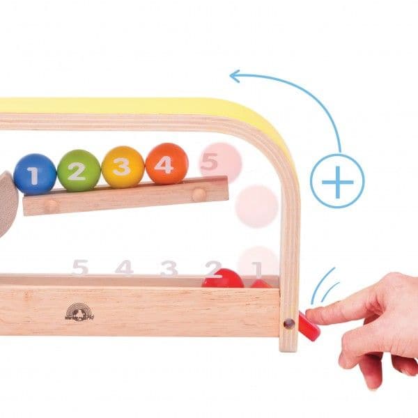 Counting Ball, If you're looking for a fun and interactive way to help your child learn about numbers, addition, and subtraction, the Wonderworld Counting Ball is the perfect toy for you! Made from high-quality, sustainable rubberwood, this unique wooden counting toy features a lever that allows balls to jump up to the higher level, and a rotating arm to drop them back down. With its cause and effect function, the Wonderworld Counting Ball is great for encouraging curiosity and learning in young children. I