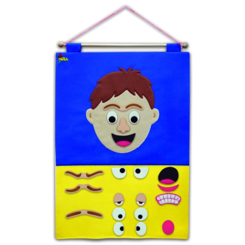 Create-a face Chart Boy, The Create-a-Face Chart Boy is a unique and interactive fabric wall chart that adds a touch of fun to any home, nursery, or school setting. Designed to promote discussions about feelings and emotions, this chart allows children to create their own happy, sad, or silly faces.The chart comes with a variety of attachable features that can be easily placed on the chart. With just a simple swapping of pieces on and off, you can quickly create a wide range of expressions. Whether it's cha