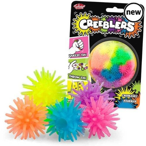 Creeblers, Pack of 24 Creeblers tendril balls that climb and tumble down walls and windows. Throw a Creebler at a smooth vertical surface and it will stick to it before gracefully walking down to the ground. The design of each creebler ball is covered with tiny tendrils, allowing it to slowly roll down whatever surface it is thrown against. Each Creebler pack contains 24 Creeblers in a variety of six colours. Product Information: • Sticky Creeblers • Spiky balls • Neon colours • 24 balls included • Pack dim