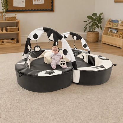 Crescent Ring Super Set Black and White with baby in early years classroom