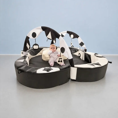 Crescent Ring Super Set Black and White with baby in baby play area