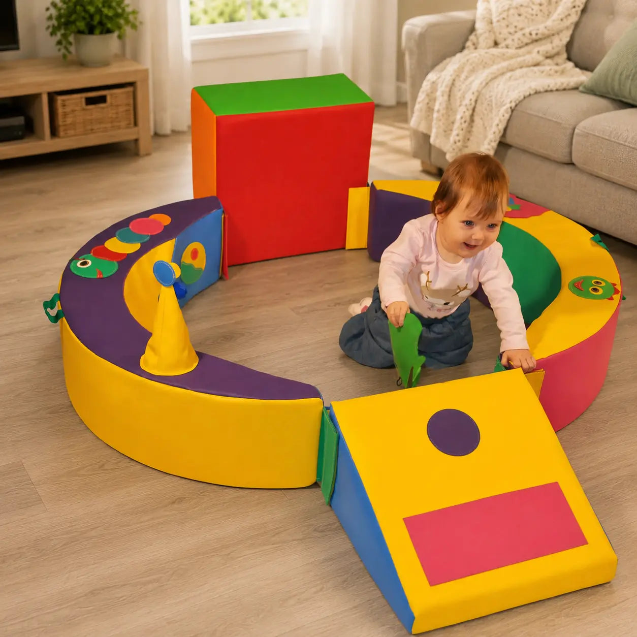 Crescent Ring Trio Exploration Set with toddler in family living room