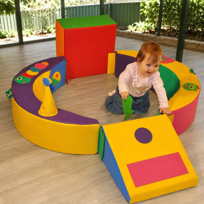 Crescent Ring Trio Exploration Set with toddler in covered outdoor play area