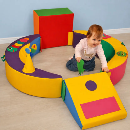 Crescent Ring Trio Exploration Set with toddler in baby play area