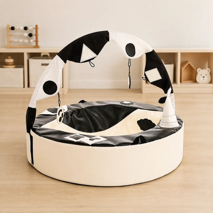 Crescent Ring with Activity Arch in a neutral nursery