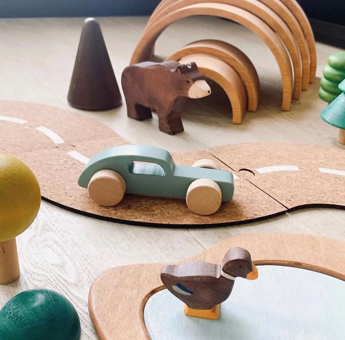 Cruisin’ Cork Road, Introducing the Cruising Cork Road, an innovative and versatile toy that allows children to create their very own road tracks and embark on exciting adventures with their favorite toys and vehicles. This 17 piece cork road mat set provides endless possibilities for imaginative play and problem-solving.Like a giant puzzle, children will use their problem-solving skills to fit the pieces together and connect them as a circuit for their vehicles to drive on. As they build and design their o