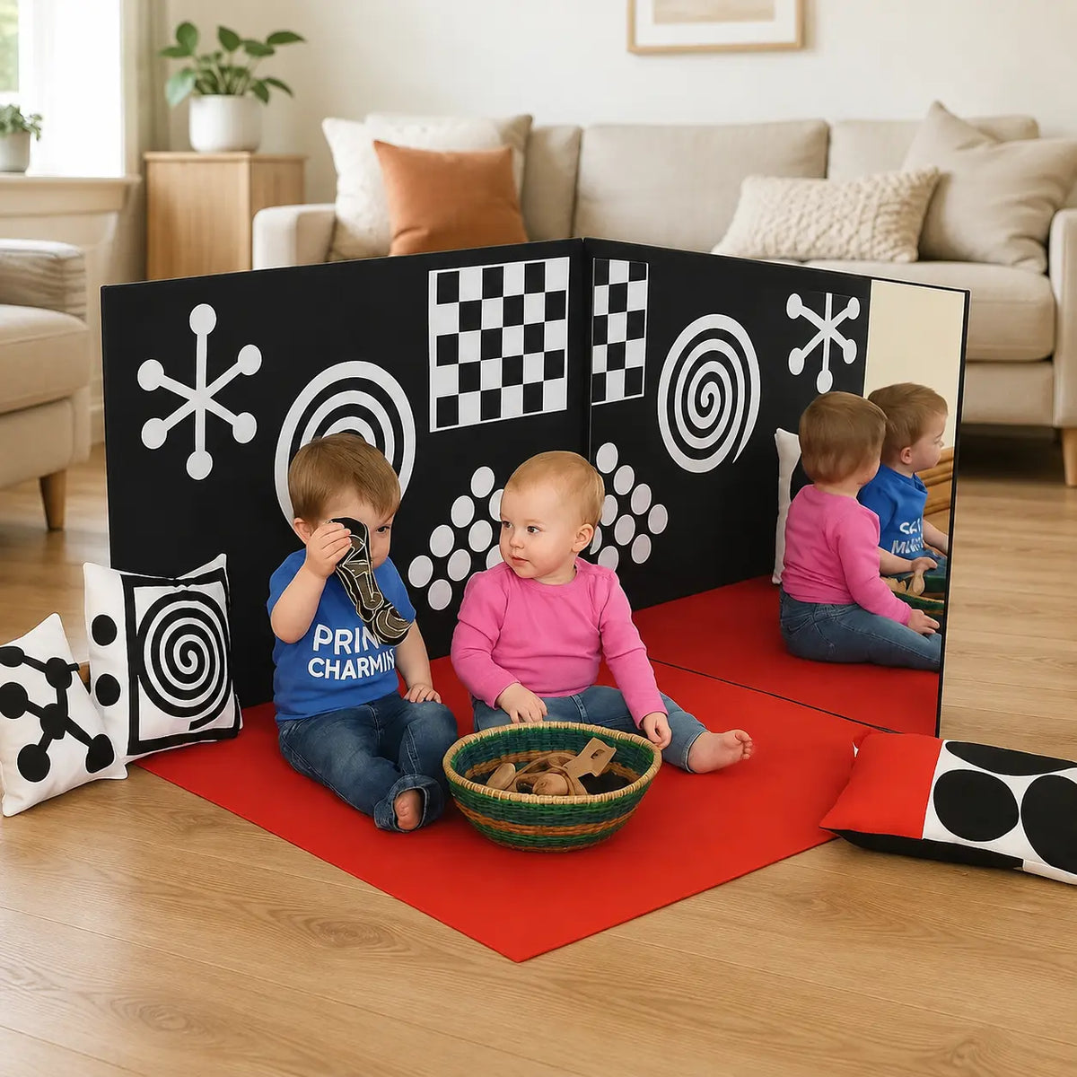 Curiosity Corner sensory panels and red play mat in a family living room