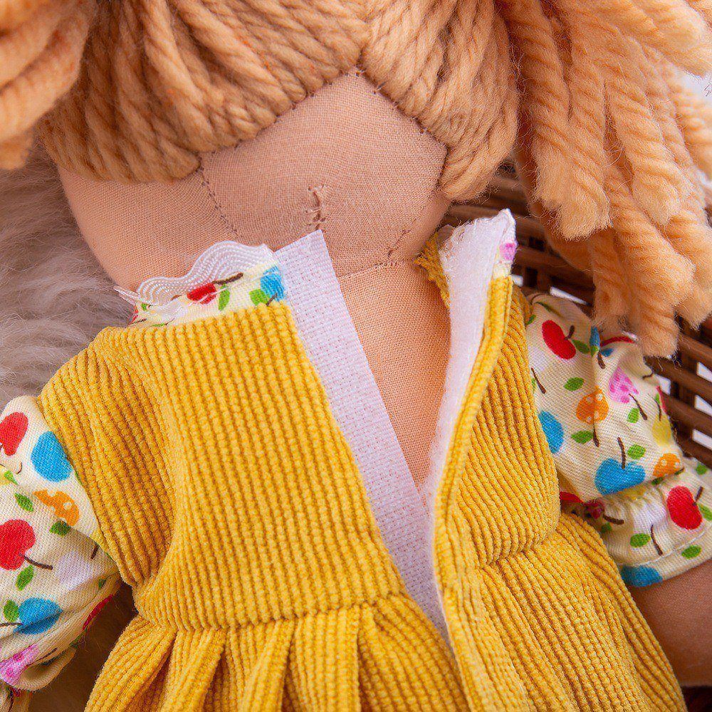Daisy Doll - Small, Introducing Daisy, the ultimate companion for endless fun and snuggly adventures! This soft and cuddly doll is guaranteed to put a smile on your little one's face. With her perpetually jubilant expression, Daisy is always happy and ready to embark on playful escapades.Daisy's vibrant and colorful outfit perfectly mirrors her sunny and joyous character. Every detail, from her cheerful dress to her radiant accessories, has been carefully designed to reflect her lively personality. Her outf