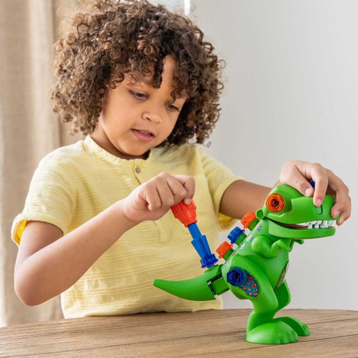 Design & Drill® Take-Apart T-Rex, Build your own T-rex with this dinosaur construction kit for preschoolers from Design & Drill®! Children use tools perfectly-sized for little hands to tinker with their very own dinosaur toy with moveable mouth and legs. Snap the 4 pieces together, and then use the kid-sized screwdriver to screw in the chunky, colourful bolts. Then head off into roar-some imaginative play with the Design & Drill Take-Apart T-Rex. Kids roar into creative play and build coordination skills as