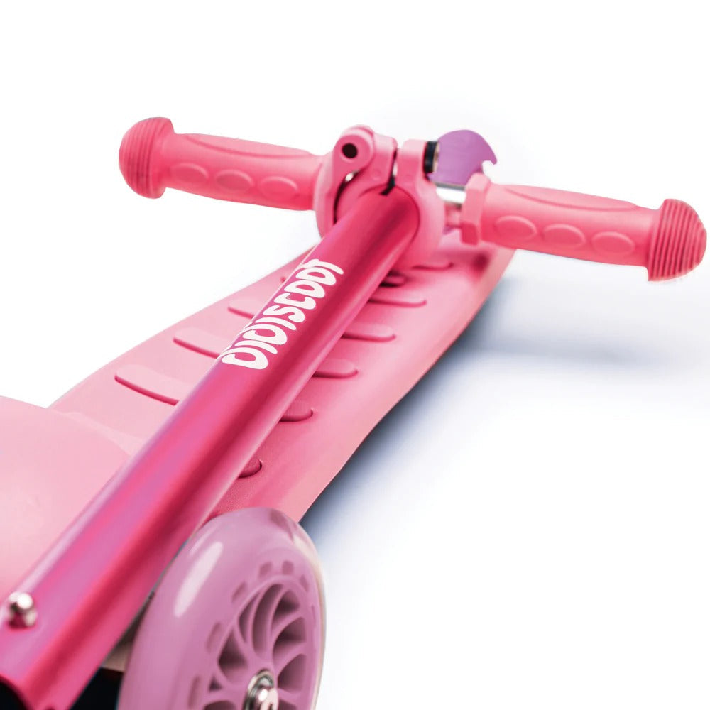 Didiscoot Pink, Enjoy a smooth ride with Didiscoot, a colourful kids 3 wheel scooter. Featuring a modern lean to steer design, it’s easy to ride - simply use your foot to get going! Didiscoot Pink develops children’s confidence, balance and mobility - the three wheels helping to keep them stable and upright. Why is Didiscoot the best scooter for kids? With no pedals or batteries required, it features an adjustable handlebar height (58cm, 67cm and 76cm) to cater for all ages; Didiscoot grows as tall as your 