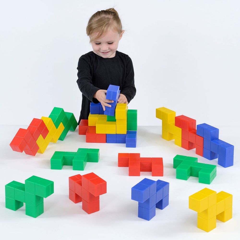 Doggy Plastic Construction Sets, The Doggy Plastic Construction Set contains brightly coloured set of 20 dog shaped pieces in 4 bright colours. Designed by Eero Aarnio, the world renowned interior designer, this set of 20 plastic dog shaped blocks is sure to delight children and can be used in a variety of ways. The very youngest children can treat them as dogs and use them as play items. The Doggy Plastic Construction Set offers a multi-faceted play experience that caters to different developmental areas: 