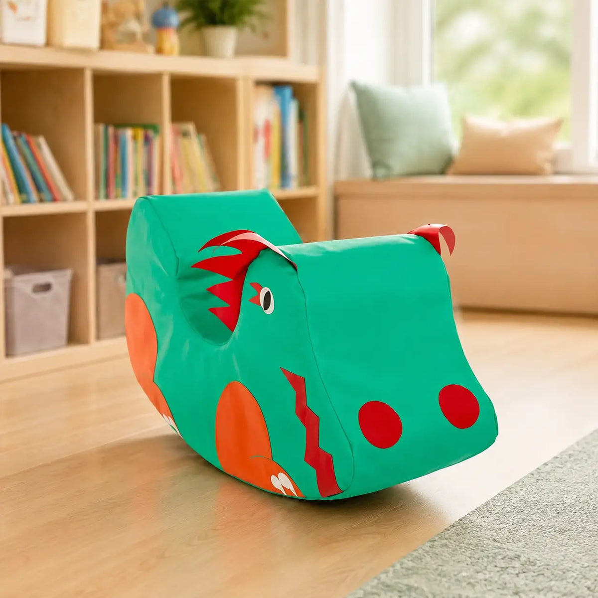 Dragon Rocker turquoise soft foam children's rocker in a school reading corner