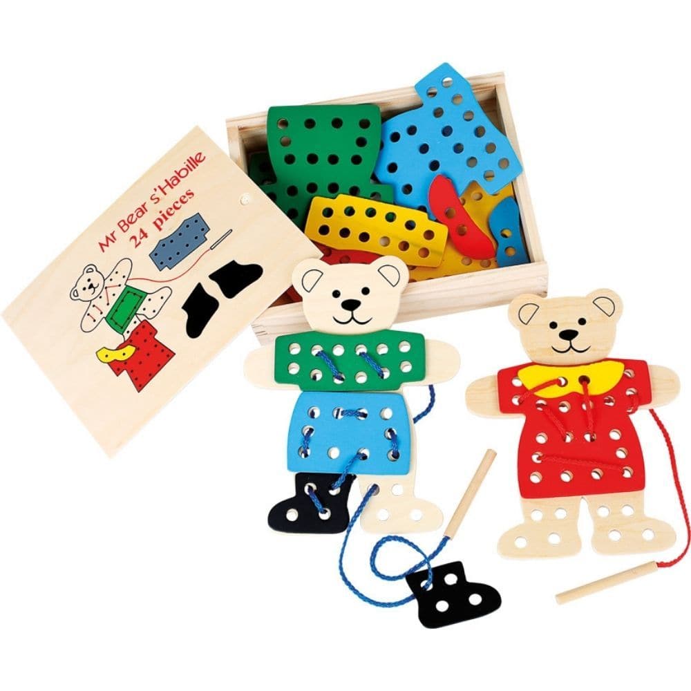 Dress-Up Bears Threading Game, Step into a world of fun and creativity with the Dress-Up Bears Threading Game! This engaging and colorful game offers children an endless array of styling options as they adorn two charming bear figures with a variety of delightful wooden clothing items. Dress-Up Bears Threading Game Features: Dimensions: Approximately 14 x 0.5 x 18 cm, making it the perfect size for little hands to maneuver and play with ease. Material: Crafted from high-quality, kid-friendly materials ensur