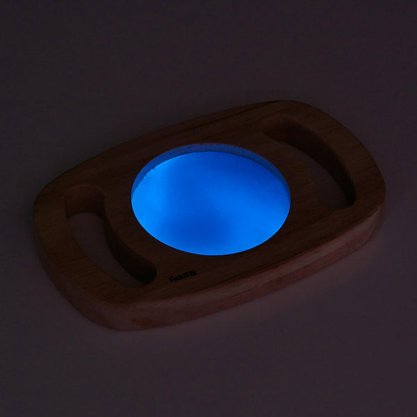 Easy Hold Glow Panel Blue, The Easy Hold Glow Panel Blue is new to our best-selling Easy Hold range, this beautiful rubberwood frame with easy grip handles contains a fascinating glow in the dark panel. The Easy Hold Glow Panel Blue is activated by leaving in bright light, when taken into a dark den it magically glows in vibrant blue. Children will love to watch the glowing liquid swirl and flow as they twist and turn the panel. The luminescent blue panel offers a new magical, vibrant and sensory perspectiv