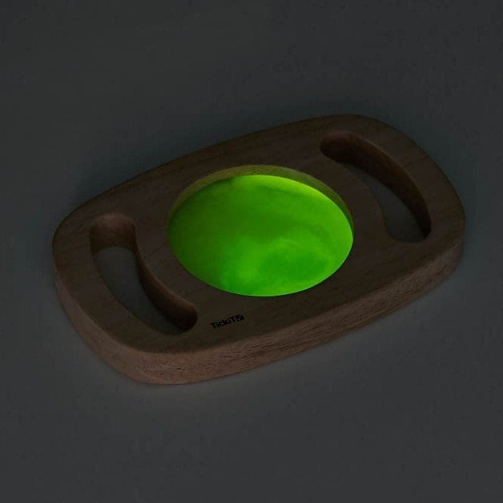 Easy Hold Glow Panel Green, The Easy Hold Glow Panel Green is new to our best-selling Easy Hold range, this beautiful rubberwood frame with easy grip handles contains a fascinating glow in the dark panel. The Easy Hold Glow Panel Green is activated by leaving in bright light, when taken into a dark den it magically glows in vibrant blue. Children will love to watch the glowing liquid swirl and flow as they twist and turn the panel.TickiT® Easy Hold Glow Panels have solid rubberwood frames with easy to hold 