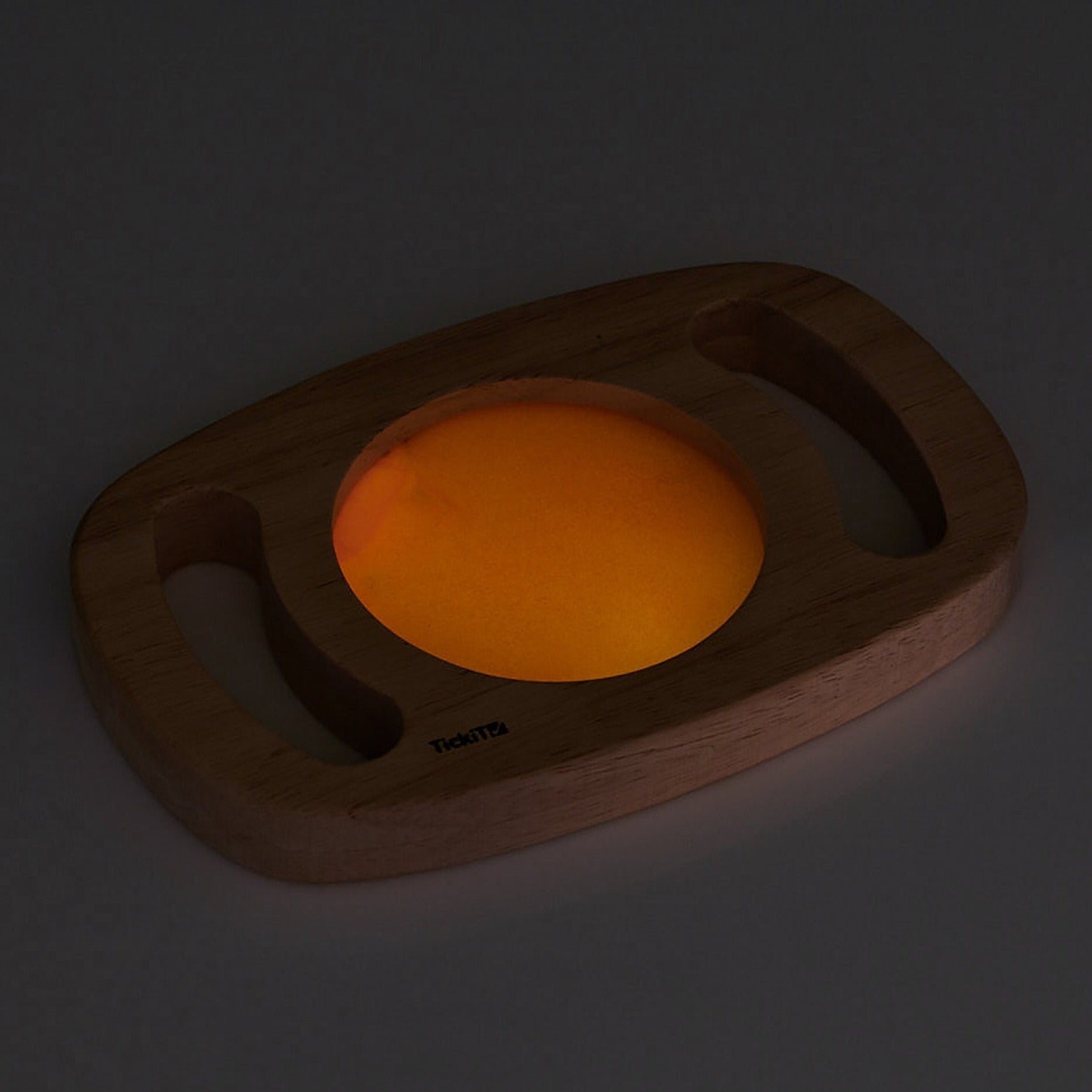Easy Hold Glow Panel Orange, The Easy Hold Glow Panel Orange is new to our best-selling Easy Hold range, this beautiful rubberwood frame with easy grip handles contains a fascinating glow in the dark panel. The Easy Hold Glow Panel Orange is activated by leaving in bright light, when taken into a dark den it magically glows in vibrant orange. Children will love to watch the glowing liquid swirl and flow as they twist and turn the panel. The luminescent orange panel offers a new magical, vibrant and sensory 