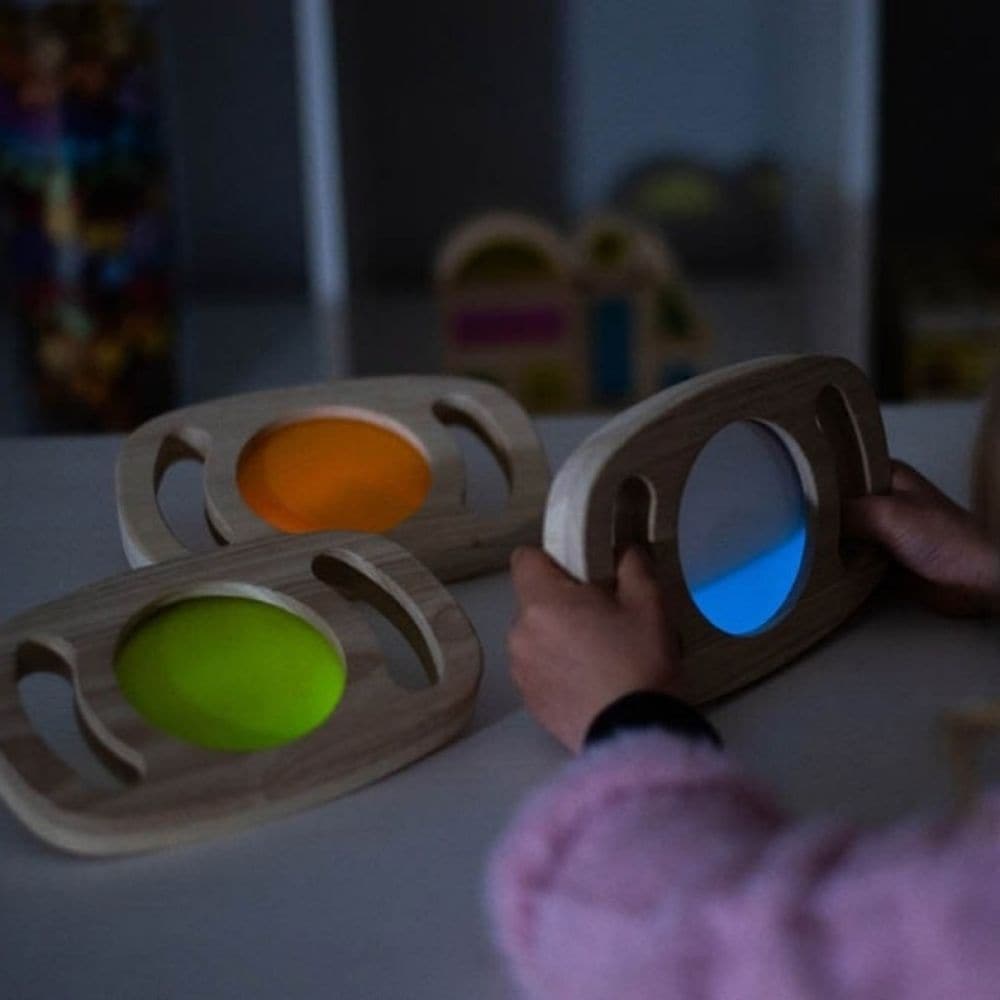 Easy Hold Glow Panel Orange, The Easy Hold Glow Panel Orange is new to our best-selling Easy Hold range, this beautiful rubberwood frame with easy grip handles contains a fascinating glow in the dark panel. The Easy Hold Glow Panel Orange is activated by leaving in bright light, when taken into a dark den it magically glows in vibrant orange. Children will love to watch the glowing liquid swirl and flow as they twist and turn the panel. The luminescent orange panel offers a new magical, vibrant and sensory 