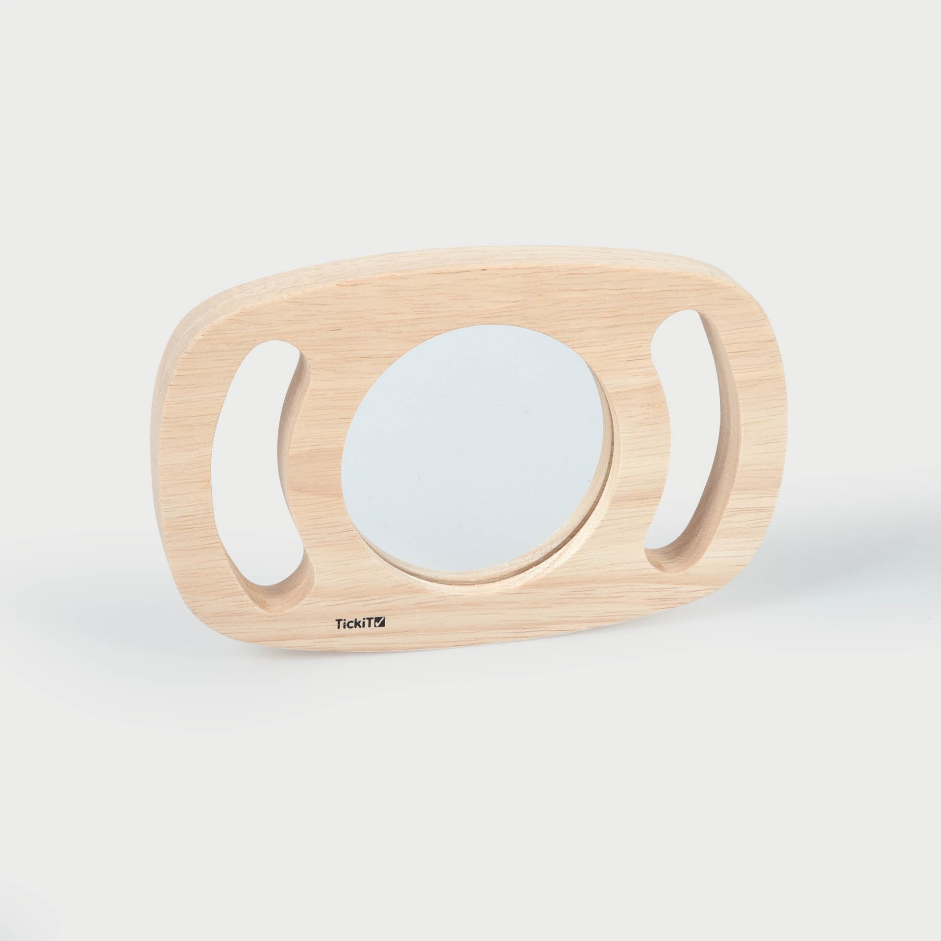Easy Hold Plane Mirror, Introducing the TickiT Easy Hold Plane Mirror – Where Curiosity Meets Reflection! Our TickiT Easy Hold Plane Mirror is a remarkable tool designed to ignite curiosity and self-awareness in young learners. This innovative Easy Hold Plane Mirror boasts several features that make it an exceptional addition to early childhood education: Easy-to-Hold Design: Crafted with a solid rubberwood frame and handles, this mirror is perfectly sized for small hands to grasp securely. The ergonomic de