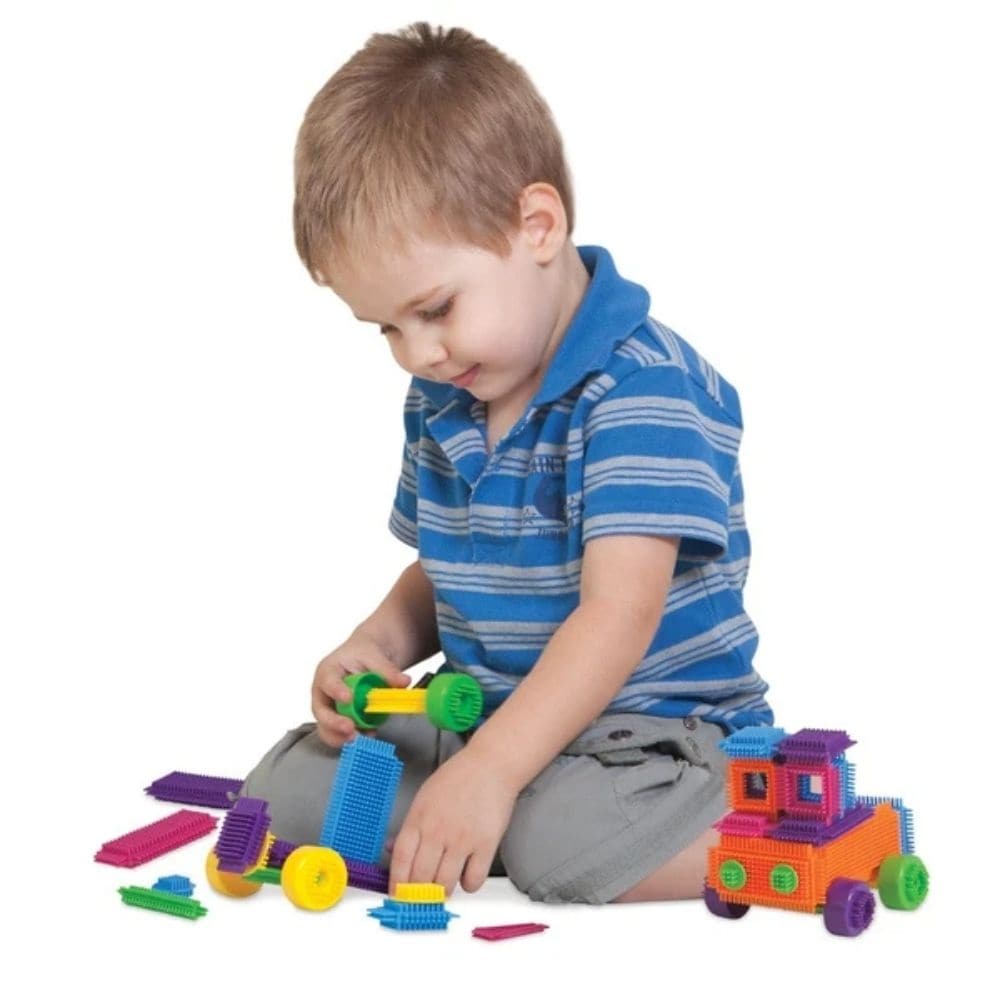Edushape Magic Brix 72 Pieces, Introducing Edushape Magic Brix - the perfect building blocks for pre-schoolers! These tactile, completely flexible, and bendy shapes come in bright, eye-catching colors that little hands will love. With their nubby texture, these bristly blocks provide a unique sensory experience that will keep kids engaged for hours. The Edushape Magic Brix 72 Pieces set is designed to help children develop their imagination, creative thinking, fine motor skills, hand-eye coordination, and b