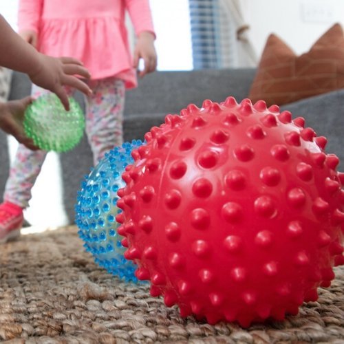 Edushape Sensory Ball Mega Pack, Introducing the Edushape Sensory Ball Mega Pack - a set of four uniquely textured, multi-colored balls designed to stimulate your child's senses and foster their development. These sensory balls are not just toys, but tools that help enhance tactile and visual sensory awareness, gross and fine motor skills, hand-eye coordination, and socialization.Each ball in the Edushape Sensory Ball Mega Pack features a distinct, nubby texture that is intriguing to touch and explore. When