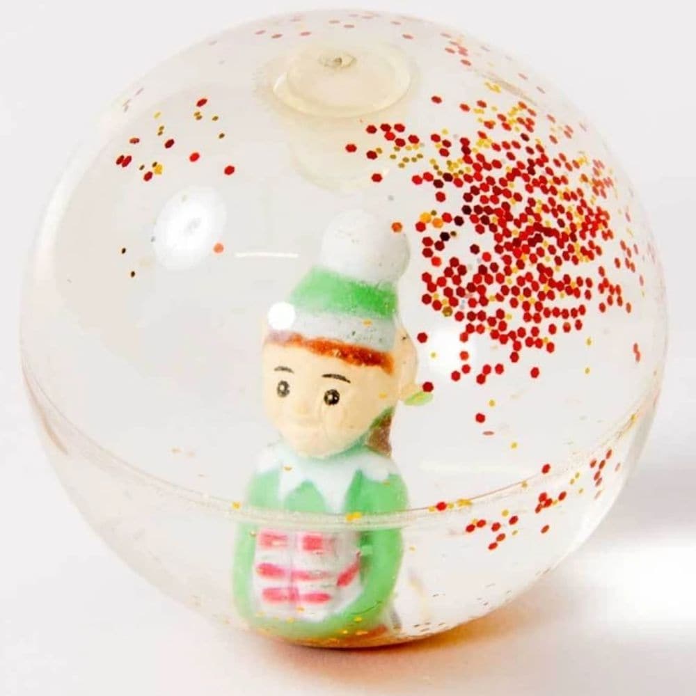 Elf Glitter Ball, Add a touch of enchantment to your holiday season with our delightful Glitter Elf Balls. These mesmerizing handheld balls are filled with shimmering Christmas elves, creating a stunning visual effect that will captivate both children and adults alike.Featuring a festive design, these glittery and shiny balls will instantly uplift the holiday spirit. The added bonus of a little Christmas elf within adds an element of surprise and joy. Watch as the elf dances and glitters inside the ball, sp