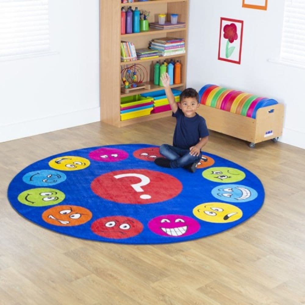 Emotions Faces Circular Carpet, This highly visual Emotions Faces Circular Carpet has 12 different emotional/feelings expressions to encourage group discussion about feelings and interaction. The Emotions Faces Circular Carpet brings colour and character into any classroom or early years settings and provides the perfect resource to talk about emotions and facial expressions. The Emotions Faces Circular Carpet is a hugely popular resource within SEN school placements. 2m circular carpet featuring 12 differe