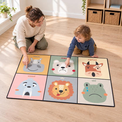 Practitioner and child discussing expressions on the Feelings Playmat