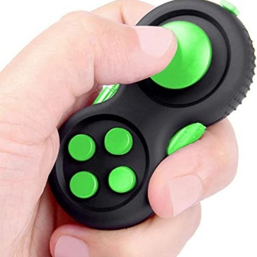 Fidget Pad, This Fidget Pad is the latest in a series of stress relieving devices that have been making the rounds, and it’s a versatile one, covered in all sorts of gubbins that’ll help your stress levels decrease. The Fidget Pad is shaped similarly to a game controller pad, but small enough to fit in your pocket, there are a variety of different controls – to begin, there is a clickable joystick that turns and clicks at your leisure. In addition, there are a series of four buttons arranged in a diamond sh