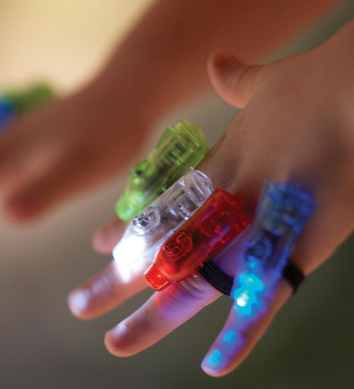 Finger torches pack of 4, The bright LED Finger Light torch is a must-have accessory for anyone who loves to bring a little sparkle and shine to their world. Simply attach it to any finger and watch as it illuminates and follows your every move. But why stop at just one? With the Finger Light torch set, you can attach all four LED lights to create a mesmerizing multi-colored light show. Whether you're hosting a party, creating a sensory experience, or simply having fun in a darkened area, these torches are 