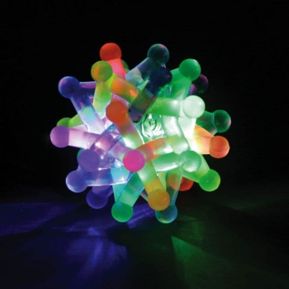 Flashing Neutron Ball, The Flashing Neutron Fidget Ball is full of stellar bouncing action! This fun stress reliever is a colourful, firm but flexible, high bounce ball. Fidget with it, play catch, or bounce it to activate a multi-coloured light show. This cool fidget ball is made of colourful 3 inch star shapes interwoven around a light-up centre. Flashing Neutron Ball is approximately 2.5" diameter, rubbery plastic, light up mechanism inside. Flashing Neutron Visual Tracking Tactile: Unique Texture Gross 