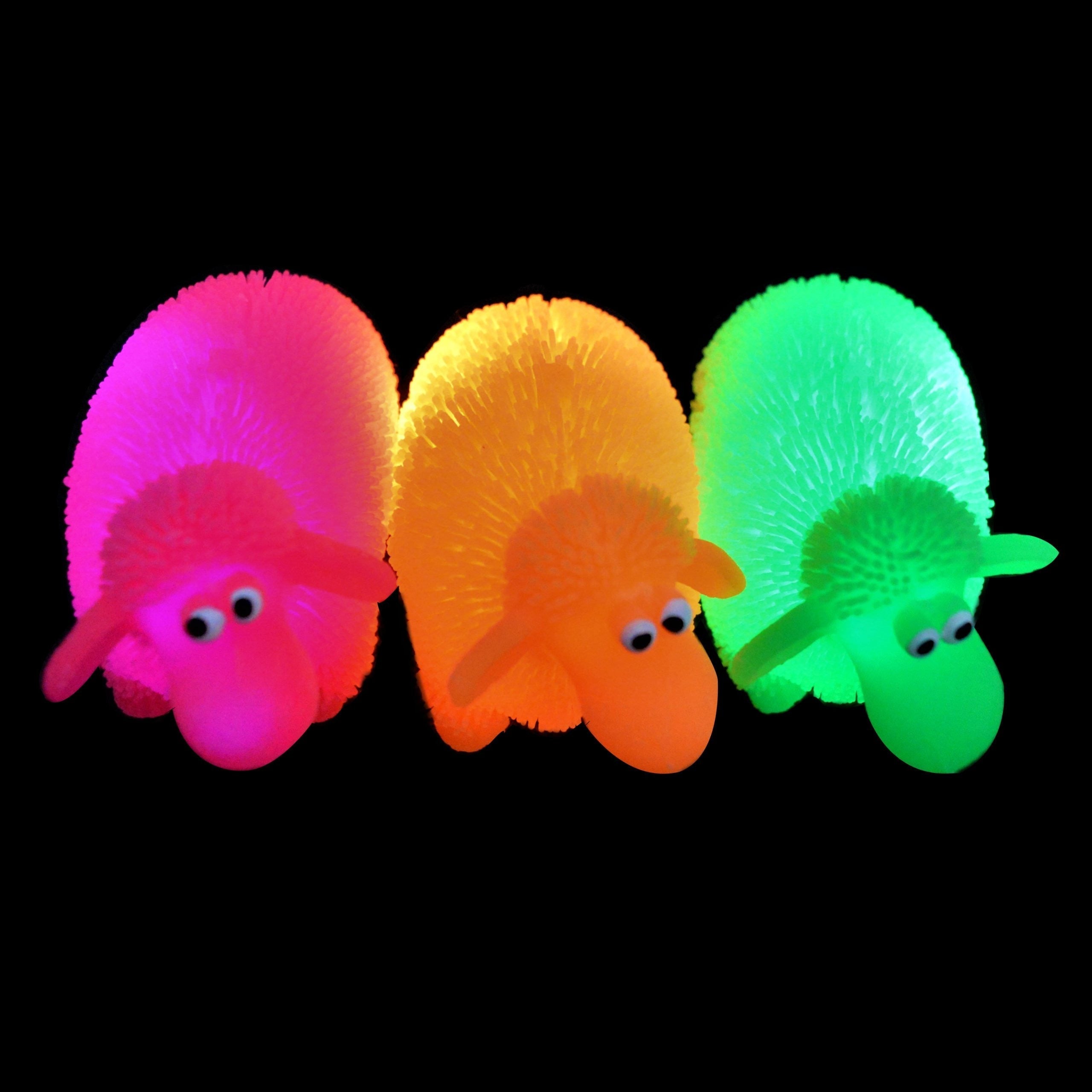 Flashing Sheep Puffer Toy, Air-filled puffer sheep toy with light-up flashing insides. Knock the Flashing Sheep Puffer Toy against a surface and it will start flashing from the inside, with the colourful lights causing his body to glow. Its body is covered with short and stretchy tendrils too, with key features raised to make them stand out. Supplied in an assortment of colours.The Flashing Sheep Puffer Toy is incredibly tactile being and made from a super squishy, soft silicone with little raised bumps for