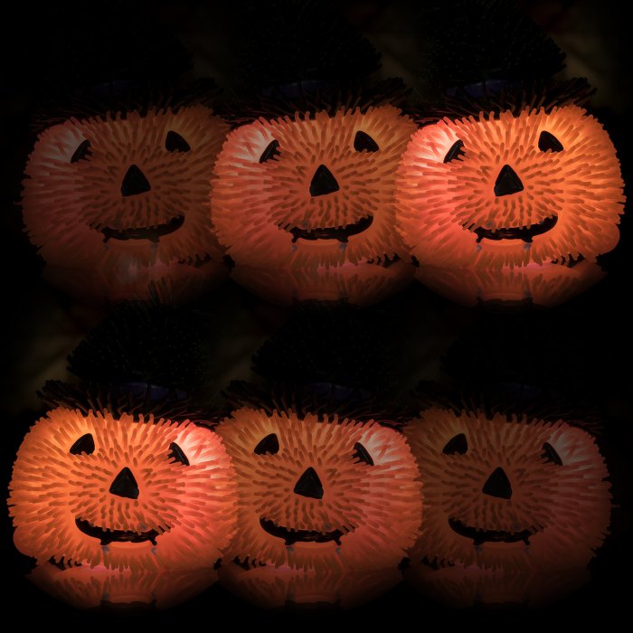 Flashing spooky squidgies, Halloween themed squishy puffer toys. Each Flashing spooky squidgie is filled with air and super squishy. Give it a rattle and you will activate the LED inside that makes the toy light up and flash in the dark.Knock the air-filled toy against a surface and it will start flashing from the inside, with the colourful lights causing the body to glow. Its body and hat are covered with short and stretchy tendrils. Air-filled squishy pumpkin Lights up when knocked Covered in small and st
