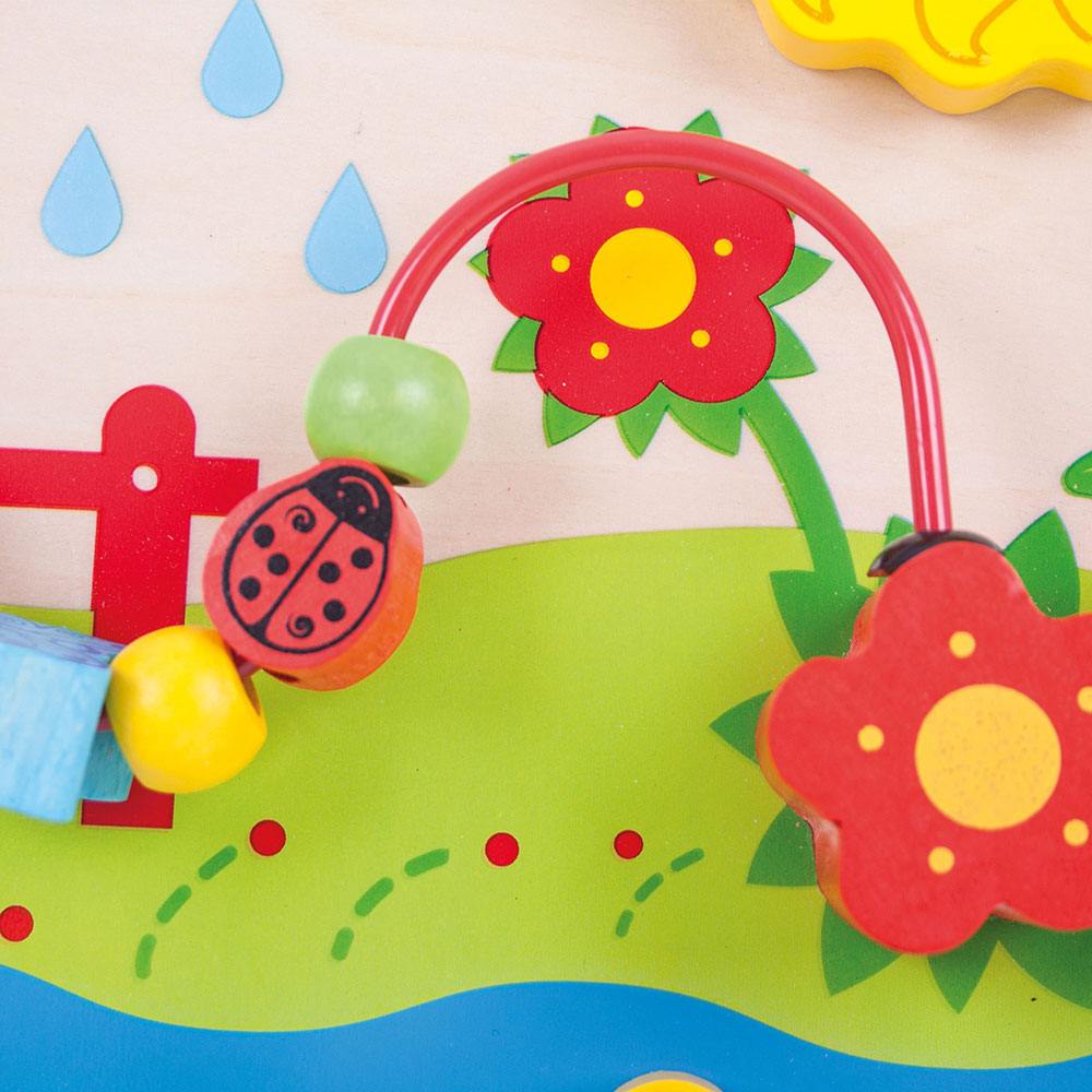 Flower Activity Centre, The Flower Activity Centre is a versatile and engaging toy that's ideal for encouraging a range of developmental skills in your little one. With straps designed to attach it securely to a cot bed, it's easily accessible and promises a world of discovery right at your child's fingertips. One of the highlights is the spinning sun and flower, which not only entertain but also help improve fine motor skills as your child learns to grasp and turn the pieces. The matching blocks featuring 