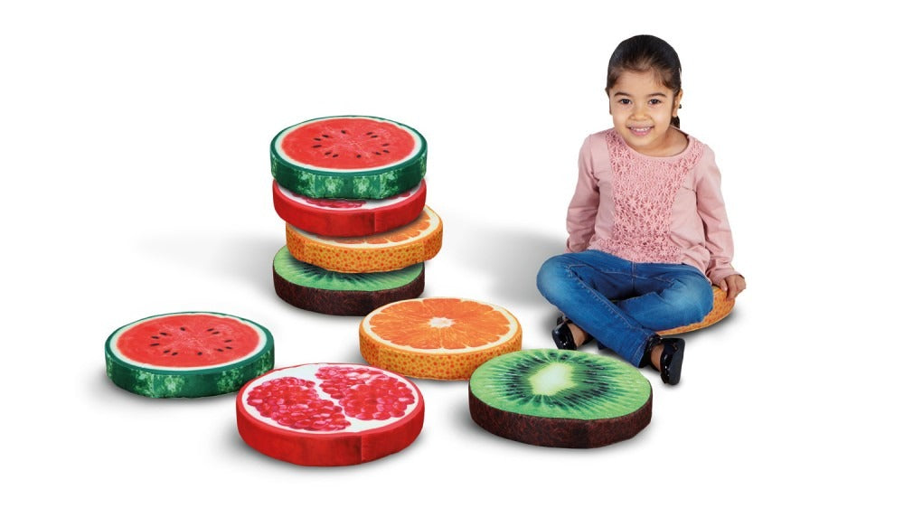 Fruit Cushions Pack of 4, As health and well being become increasingly important classroom topics , our fun fruit cushions are the perfect new addition to the teaching environment. These high quality Fruit cushions are great for supporting fundamental areas of learning and development such as Understanding the World and Communication & Language. Attractive and realistic fruit range of cushions that can also be used to facilitate learning of health and self-care. Four different fruit cross-sections to suppor