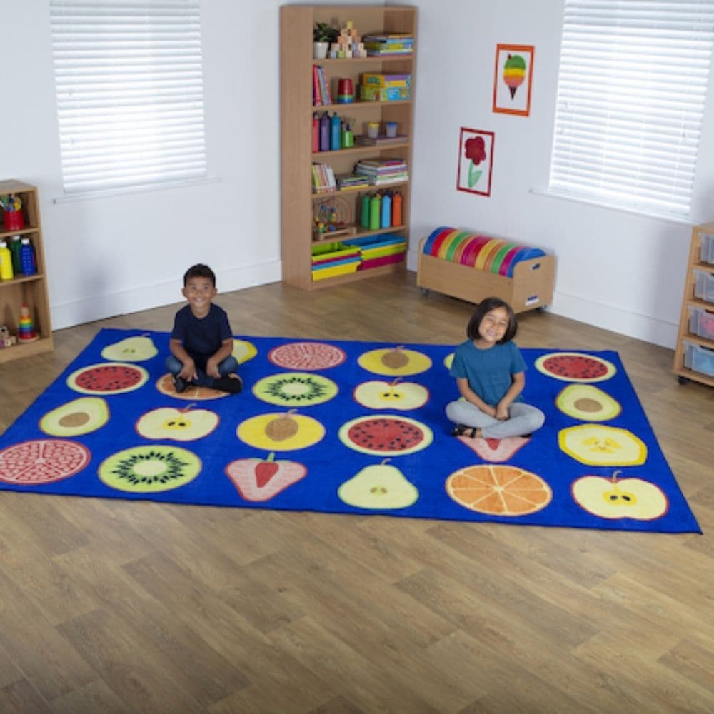 Fruit Rectangular Placement Carpet 3x2, As health and well being become increasingly important classroom topics,our Fruit Rectangular Placement Carpet is the perfect new addition to the teaching environment. The Fruit Rectangular Placement Carpet is colourful,Stylish and bright this Fruit Rectangular Placement Carpet will become a children's favourite in any classroom. This thick and soft carpet features 24 placement spots and is ideal for supporting fundamental areas of learning and development such as Und