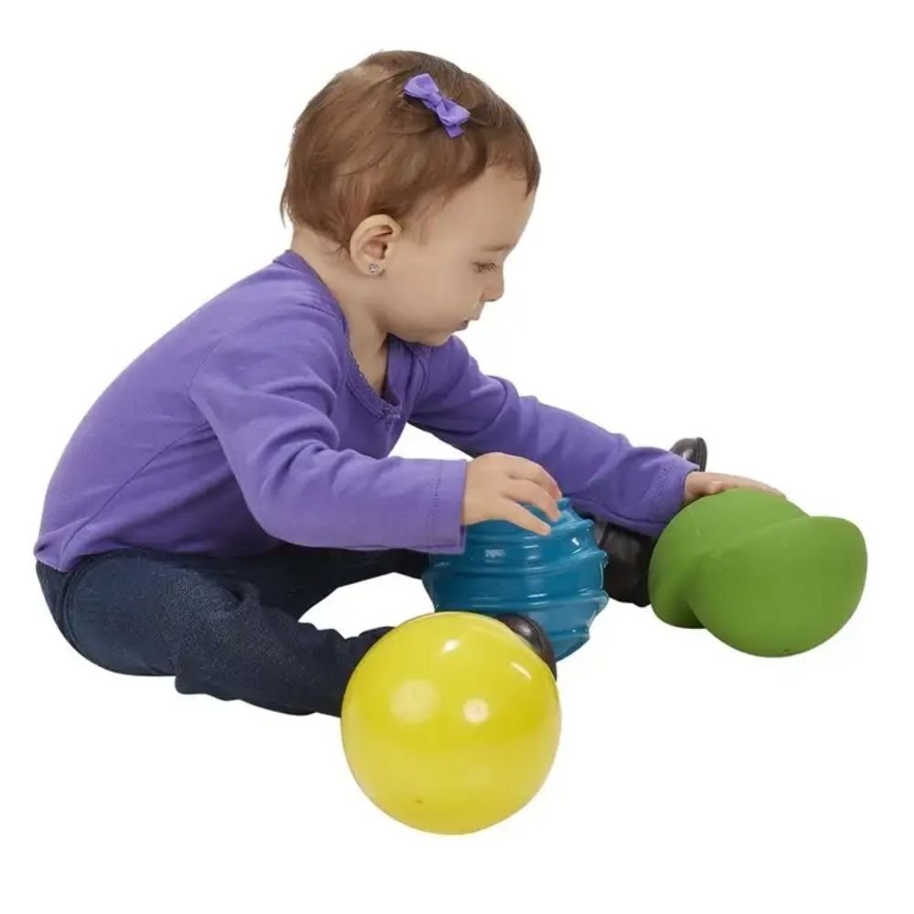Fun Z Balls Set of 3, Discover a world of sensory amusement with the unique Fun Z Sensory Balls. This set of three vibrantly coloured balls offers a different tactile and visual experience, each designed to stimulate the senses while enhancing motor skills. Perfect for infants and toddlers, these balls take playtime to a whole new level by introducing the fundamentals of logic and early science. Features of the Fun Z Balls Set of 3: Unique Design Distinct Characteristics: Each Fun Z Ball has its own unique 