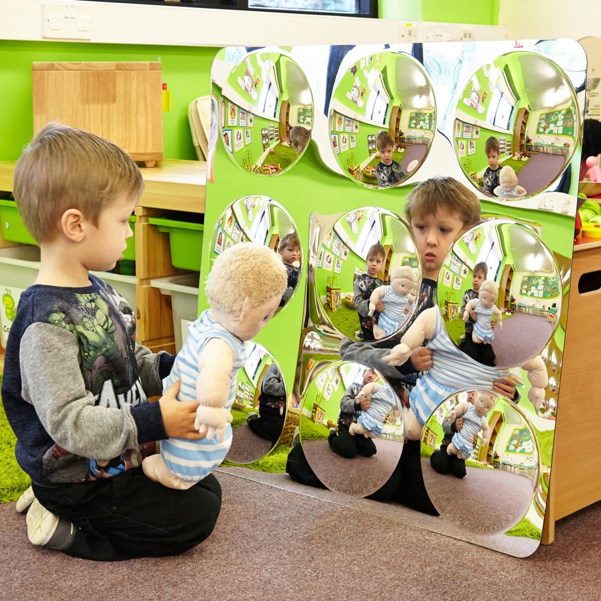 Giant 9 Domed Acrylic Mirror Panel 780mm, The TickiT Giant 9-Domed Acrylic Mirror Panel is made from scratch resistant acrylic these mirror panels are safe and ideal for any classroom or nursery setting. Children are drawn to the TickiT Giant 9-Domed Acrylic Mirror Panel for the observation of themselves and objects. The Giant 9 Domed Acrylic Mirror is a convex mirror domes which provide a distorted, fun and interesting view of the world for children to explore. The TickiT Giant 9-Domed Acrylic Mirror Panel