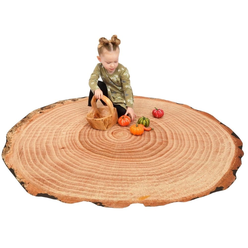 Giant Log Playmat, Introduce a slice of nature into your educational setting with our Giant Log Playmat. Designed with young, curious minds in mind, this mat blends the wonders of the outdoors with the comfort of indoor play, offering an enriching and versatile platform for learning and discovery. Features: Nature-Inspired Design: Modeled after the intricate patterns of a real log, the playmat instills an appreciation for nature right in the classroom. Versatile Use: This expansive mat isn’t just for play! 