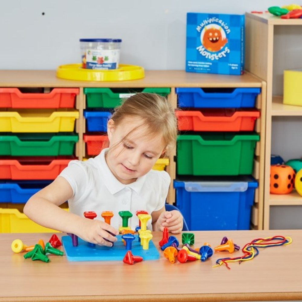 Giant Pegs and Pegboard Set, Our big, chunky Geo Pegs and Pegboard Set is ideal for little hands to manipulate! Kids practice sorting, counting and patterning as they stick jumbo plastic pegs into the peg board. The Geo Pegs and Pegboard Set contain 36 stackable giant pegs in 6 bright colours, 3 shapes, with 21cm square base board and 3 laces. Ideal for developing fine motor skills, counting, sorting and patterning. This Giant Pegs and Pegboard Set is ideal for the early years classroom when it comes to dev