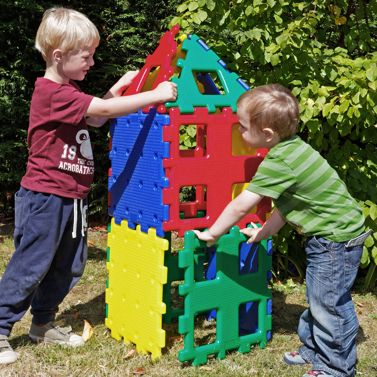 Giant Polydron XL Set 1, The Giant Polydron XL Set 1 is the ultimate building toy for children. With its 12 large, durable pieces, children can let their imaginations run wild as they create castles, princess towers, cars, boats, houses, and even tunnels to crawl through. This set is not only fun but also educational. Children will learn about different shapes, both 2-dimensional and 3-dimensional objects. They will also develop an understanding of texture, teamwork, and role play as they work together to b