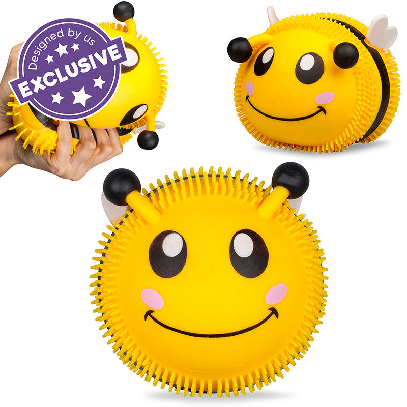 Giant Puffem Bee, Introducing our adorable Giant Puffems bumble bee toy! This round, puffy bee can be squished and stretched in countless ways, but it always returns to its original shape. Our Puffems feature exaggerated features that make them extra cute, and they're covered in mini stretchy tendrils that make them incredibly tactile. Inside, our Puffems are filled with a special foam that creates a unique and squishy sensation. Once you pick up our Puffems, you'll find it hard to put them down! Not only a