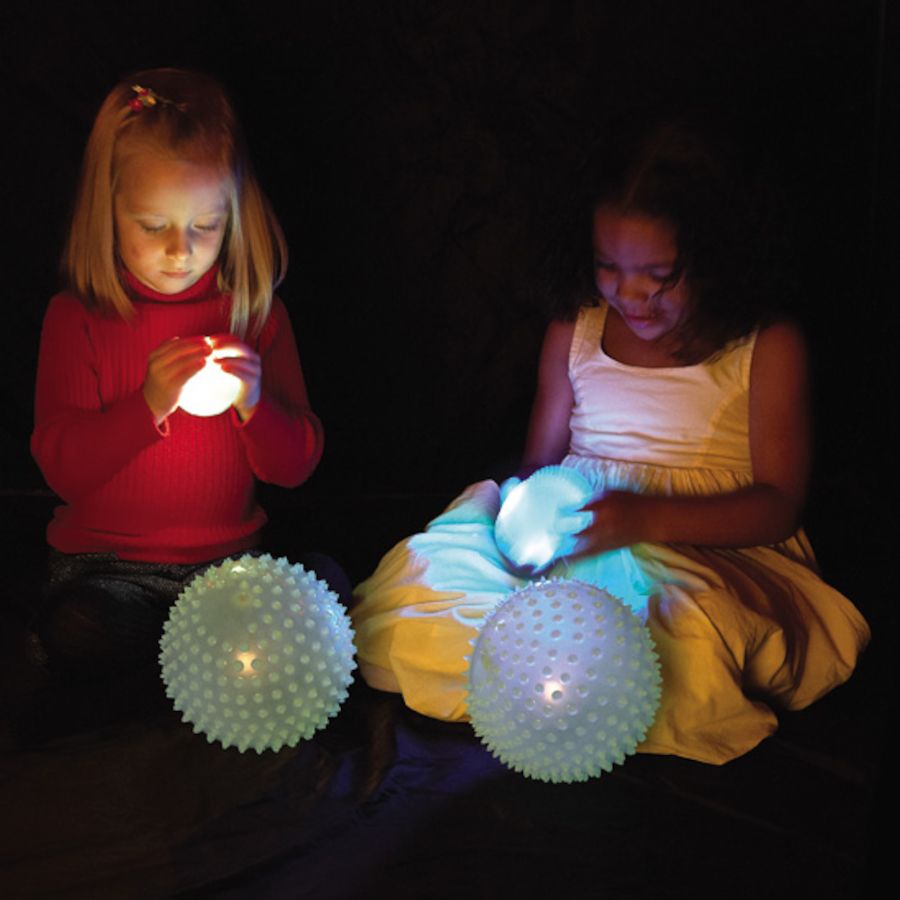 Glow in the dark sensory ball, The Glow in the Dark Sensory Ball is a multi-functional toy designed to provide a rich sensory experience for children. Let's break down its features to understand its benefits better: Soft-Textured Nodules: The surface of the Glow in the dark sensory ball is covered in soft nodules that provide a tactile sensation, beneficial for both fine and gross motor skills development. It's easy to grip, making it accessible for younger children. Glow-in-the-Dark: The Glow in the dark s