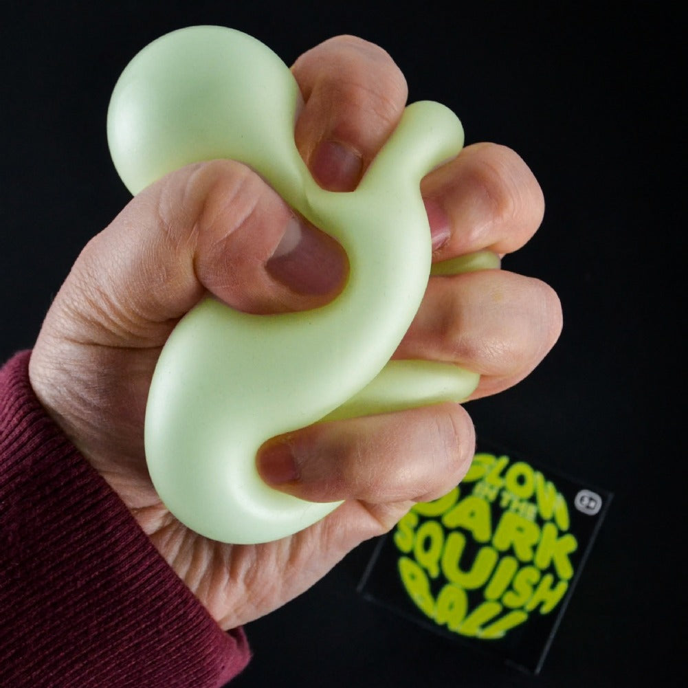Glow in the Dark Squish Ball Fidget Toy, This super glow in the Dark Squish Ball appears an 'off white' colour in normal light, but after exposed to light and then put in the dark, or used under UV blacklight it glows in a bright vibrant green. Kids and adults will love playing with this Glow in the Dark Squish Ball, for adults it's the ultimate stress ball, and for kids it's the perfect tactile fidget toy.Need to mellow out? Glow in the Dark Squish Ball is the Groovy Glob that excites your eyes while it so