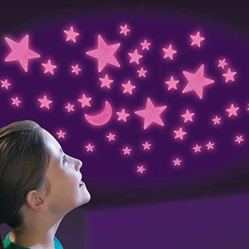 Glow stars pink glitter, Dive into a universe of shimmer and shine with our New Glow Glitter Stars – a perfect addition for any girl's bedroom or sensory room. These ethereal accents are designed to dazzle both day and night. Features: 🌟 Dazzling Pink Design: Crafted from premium pink plastic, these stars are not just any regular glow stars. They boast a sparkly appearance during the day, adding a touch of whimsy and wonder to your room. 🌙 Night-time Glow: As daylight fades, the Glow Glitter Stars come aliv