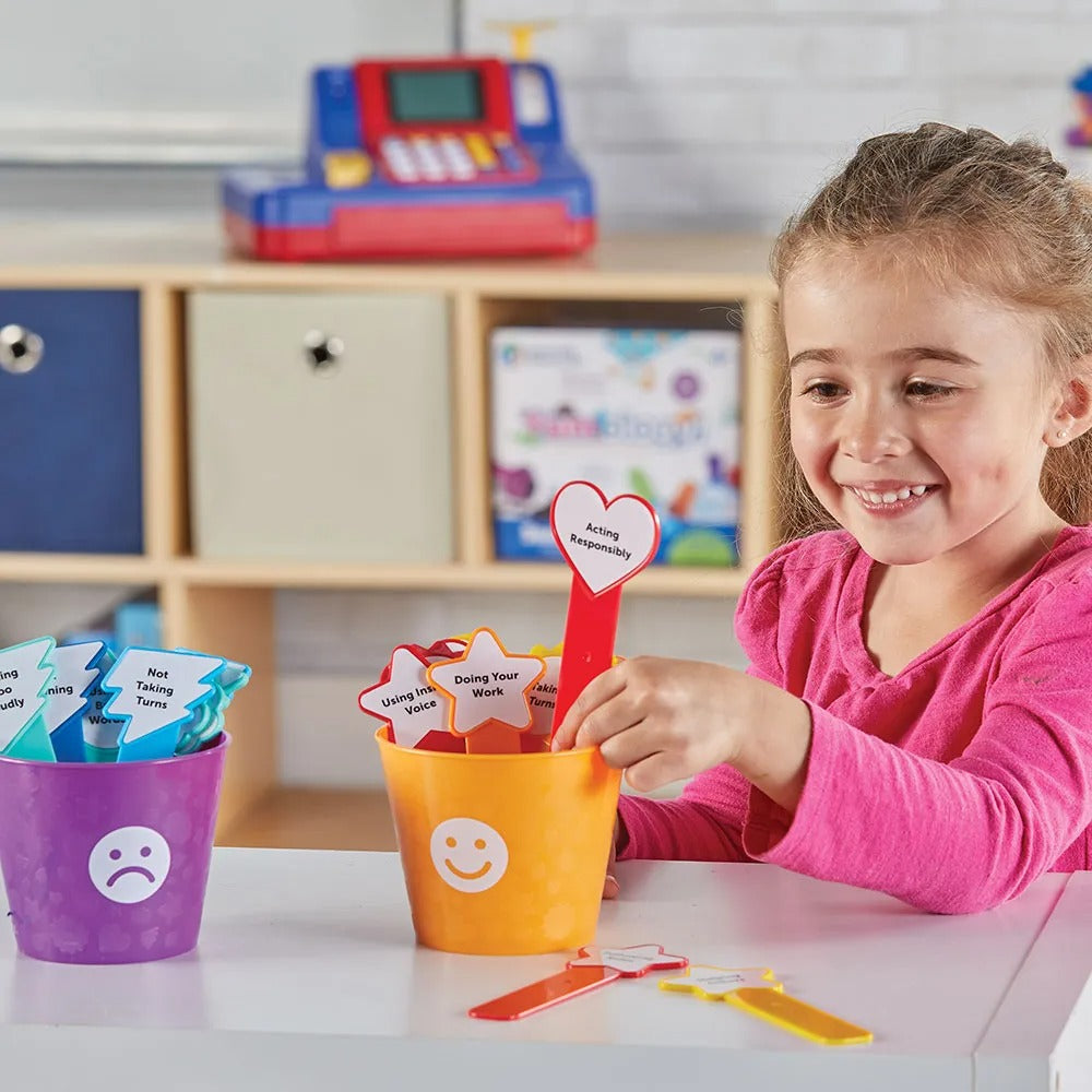 Good Behaviour Buckets, Level up your classroom management with our innovative Good Behaviour Buckets! This early childhood behaviour tracker offers teachers and children an engaging, visual way to monitor behaviour and encourage emotional development. Good Behaviour Buckets Features: Preprinted Emotions and Behaviour Stickers: The kit comes with 30 preprinted stickers that represent basic emotions and behaviours. These stickers can be easily applied to the coloured sticks, making it effortless to track var